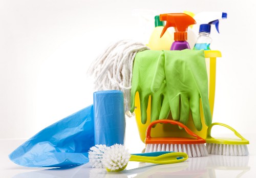 Professional hot water extraction equipment cleaning carpet fibers