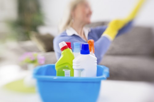 Technician using safe handling and carpet cleaning equipment